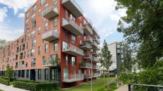 An apartment building on a sunny day.