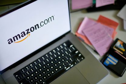 The Amazon.com logo on a laptop